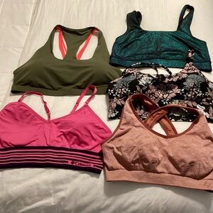 LOT OF 5 SPORTS BRAS See details in second photo.